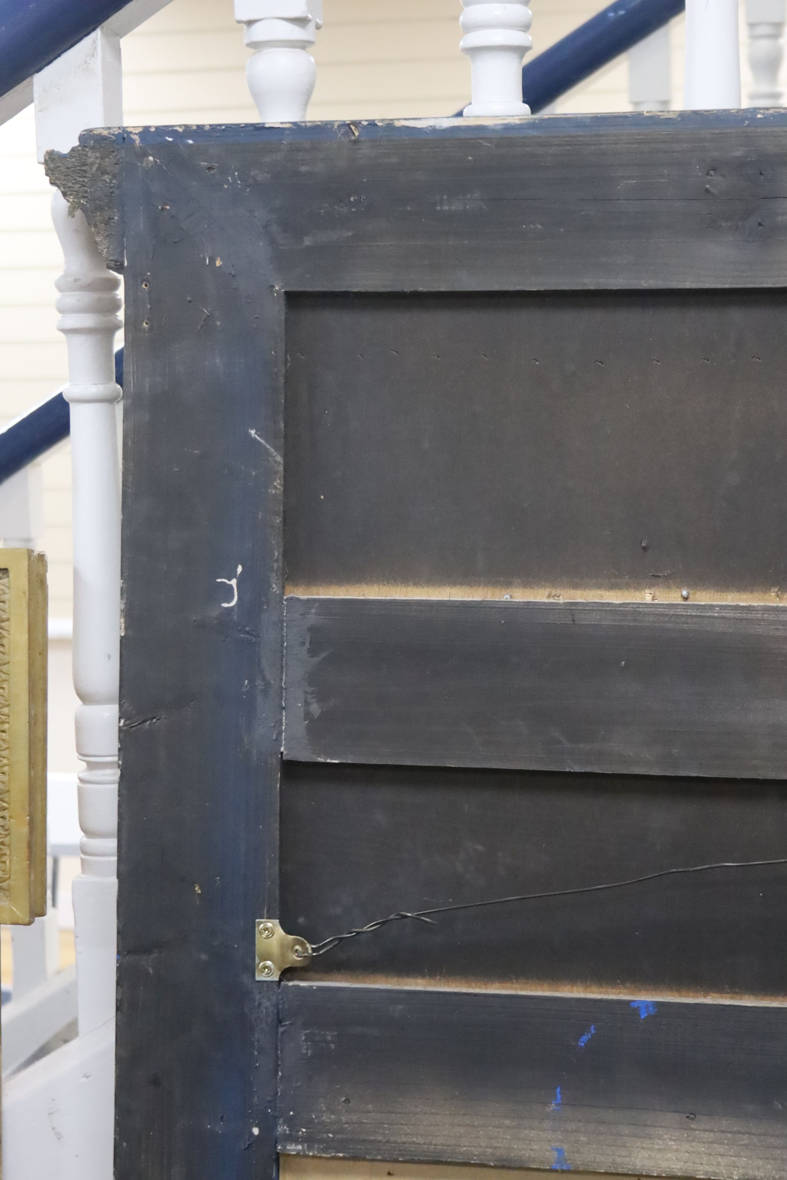 A 19th century French overmantel gilt and gesso mirror with musical themed emblem over on blue background, width 114cm, height 172cm